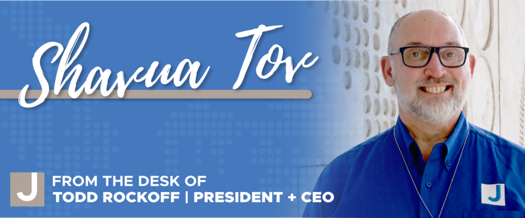 Shavua Tov and a photo of Todd Rockoff, a man in a blue collared shirt, smiling