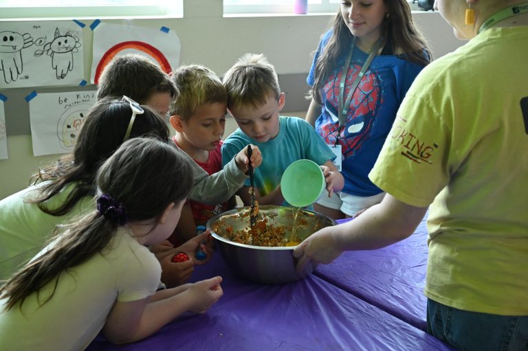kids mixing food in a bowl